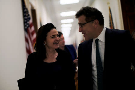REFILE - CORRECTING TITLE OF SCHRAGE Facebook Chief Operating Officer Sheryl Sandberg, L, and Vice President of communications and public policy Elliot Schrage, R, on Capitol Hill after meeting with U.S. Rep. Jackie Speier (D-CA) in Washington, U.S. October 12, 2017. REUTERS/James Lawler Duggan