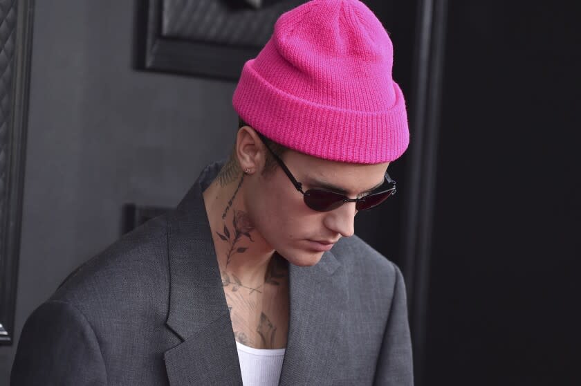 Justin Bieber arrives at the 64th Annual Grammy Awards at the MGM Grand Garden Arena on Sunday, April 3, 2022, in Las Vegas. (Photo by Jordan Strauss/Invision/AP)