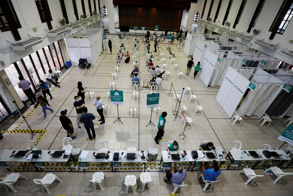 Senior citizens waiting to get a dose of the COVID-19 vaccine at a vaccination centre in Singapore.