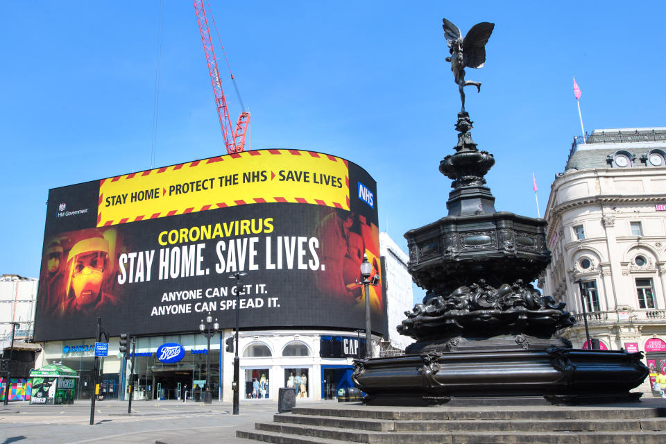 Adverts encouraging people to stay at home are displayed in an empty Picadilly Circus, as the UK continues its lockdown to help curb the spread of the coronavirus. Picture date: Thursday April 9, 2020. Photo credit should read: Matt Crossick/Empics
