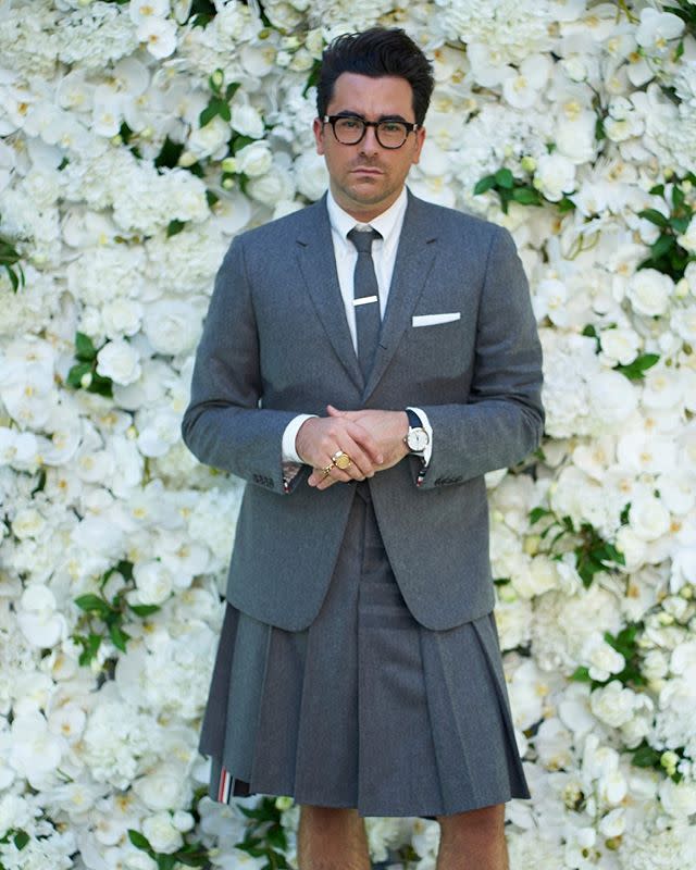 <p>Dan Levy in a skirt suit by Thom Browne. </p><p><a href="https://www.instagram.com/p/CFYIGf9DFnh/" rel="nofollow noopener" target="_blank" data-ylk="slk:See the original post on Instagram;elm:context_link;itc:0;sec:content-canvas" class="link ">See the original post on Instagram</a></p>