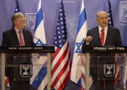 Israeli Prime Minister Benjamin Netanyahu, right, U.S. National Security Advisor John Bolton give statements to media in Jerusalem, Sunday, June 23, 2019. (AP Photo/Tsafrir Abayov, Pool)