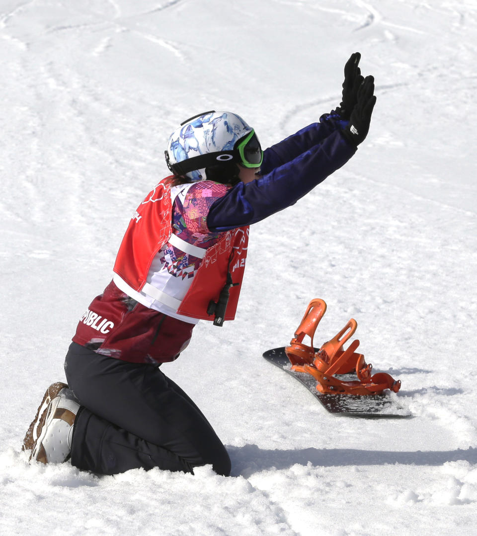 Czech Republic's Eva Samkova celebrates after taking the gold medal in the women's snowboard cross final at the Rosa Khutor Extreme Park, at the 2014 Winter Olympics, Sunday, Feb. 16, 2014, in Krasnaya Polyana, Russia. (AP Photo/Andy Wong)