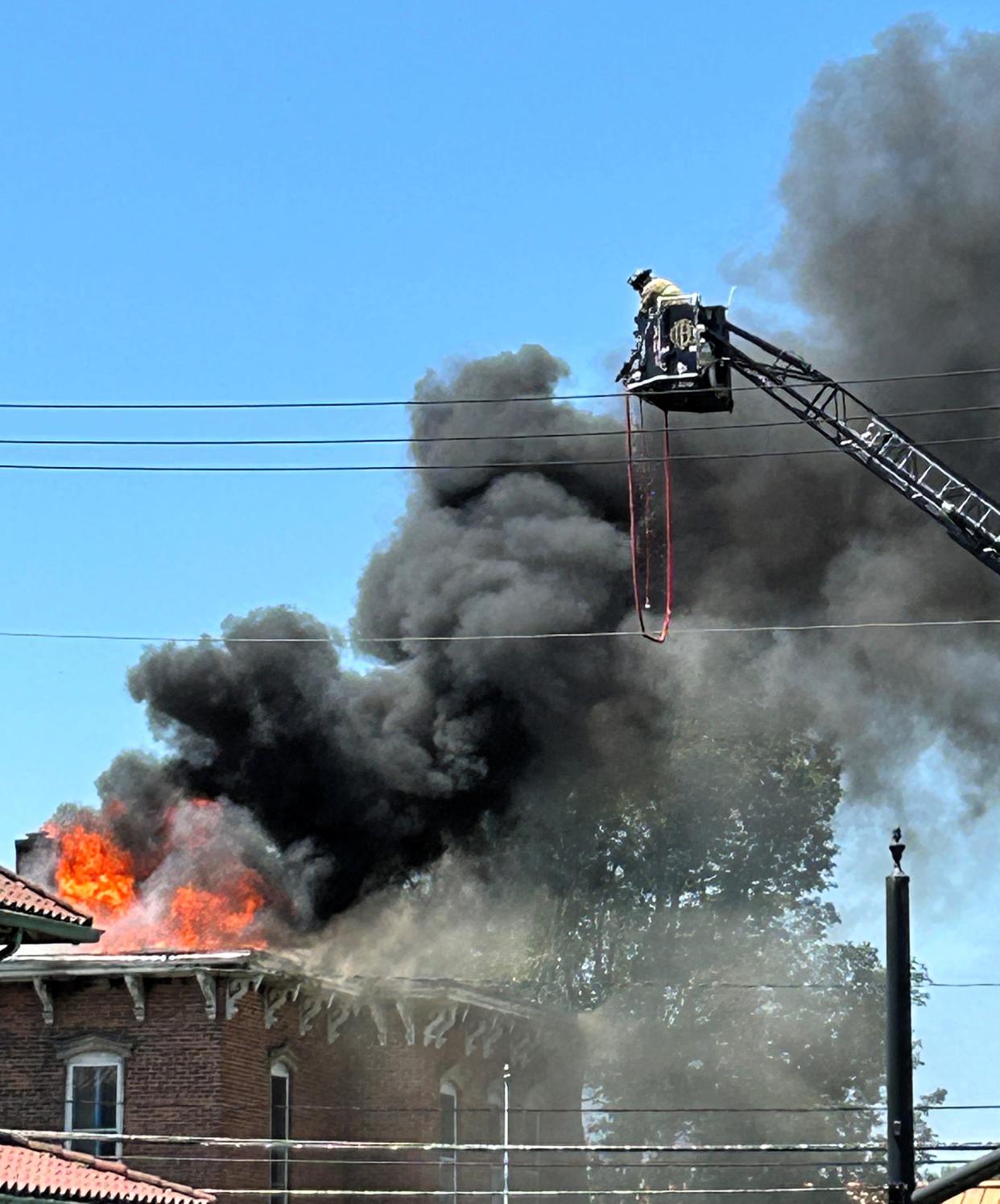 Several fire departments were called to the scene of an active structure fire late Monday morning at 555 Chestnut St.