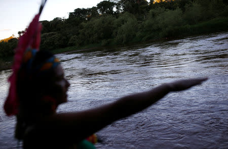 An Indigenous woman from the Pataxo Ha-ha-hae tribe looks at Paraopeba river, after a tailings dam owned by Brazilian mining company Vale SA collapsed, in Sao Joaquim de Bicas near Brumadinho, Brazil January 28, 2019. REUTERS/Adriano Machado