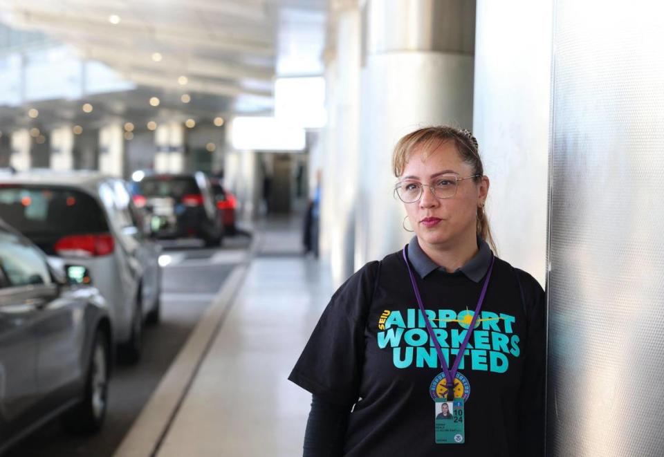 Susan Seale, 47, a wheelchair attendant at Miami airport for Southwest Airlines, works from 3 a.m. to 2 p.m. and earns $18.73 an hour with no fringe benefits. ‘All I do is work, go home to sleep, and go back to work,’ she says on Dec. 8, 2022.