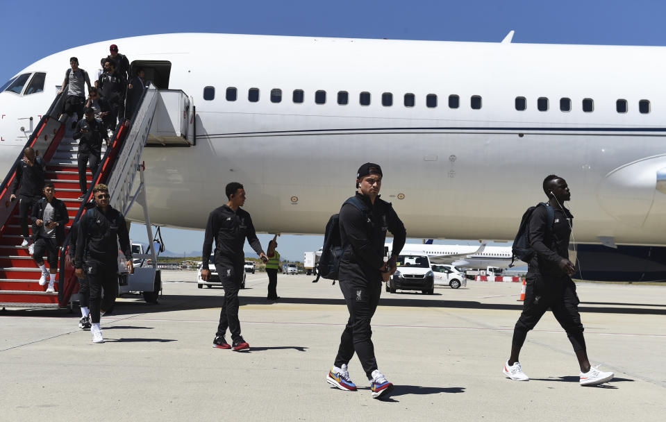 Handout photo provided by UEFA of Liverpool players arriving at Adolfo Suarez Madrid-Barajas Airport, Madrid.