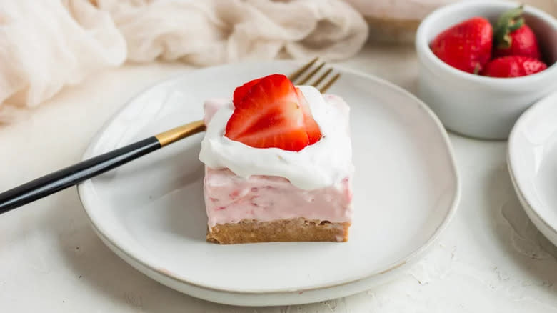 strawberry cheesecake bar on plate