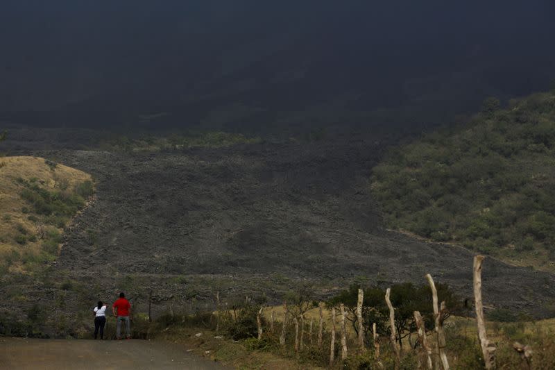 A general view shows an area covered wit ash from an eruption of the Pacaya volcano in El Rodeo