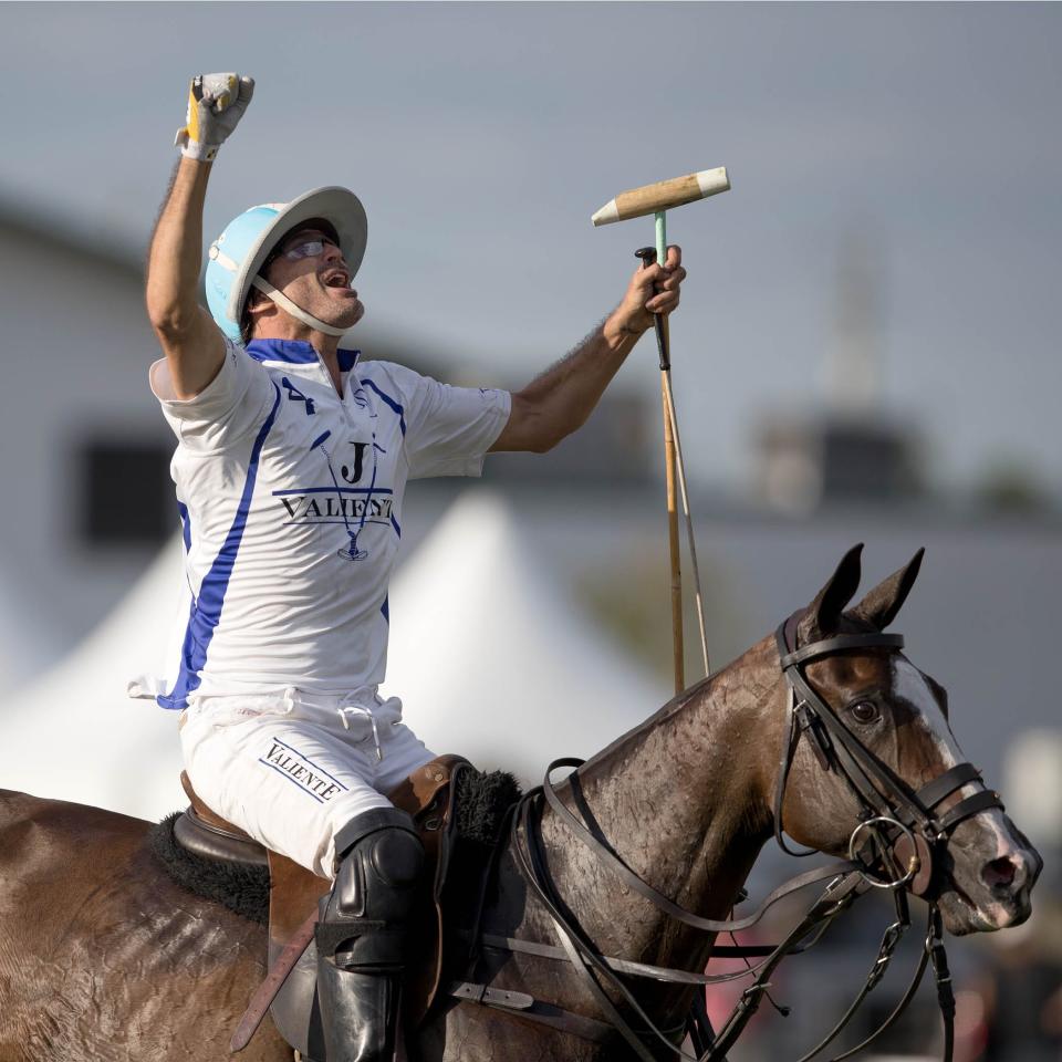 Adolfo Cambiaso, celebrating Valiente's win in the final of the U.S. Open in 2017, will not be competing this year because he sustained a groin injury during the USPA Gold Cup.