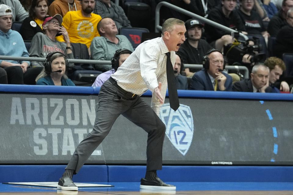 Arizona State head coach Bobby Hurley shouts during the first half of a First Four college basketball game against Nevada in the NCAA men's basketball tournament, Wednesday, March 15, 2023, in Dayton, Ohio. (AP Photo/Darron Cummings)