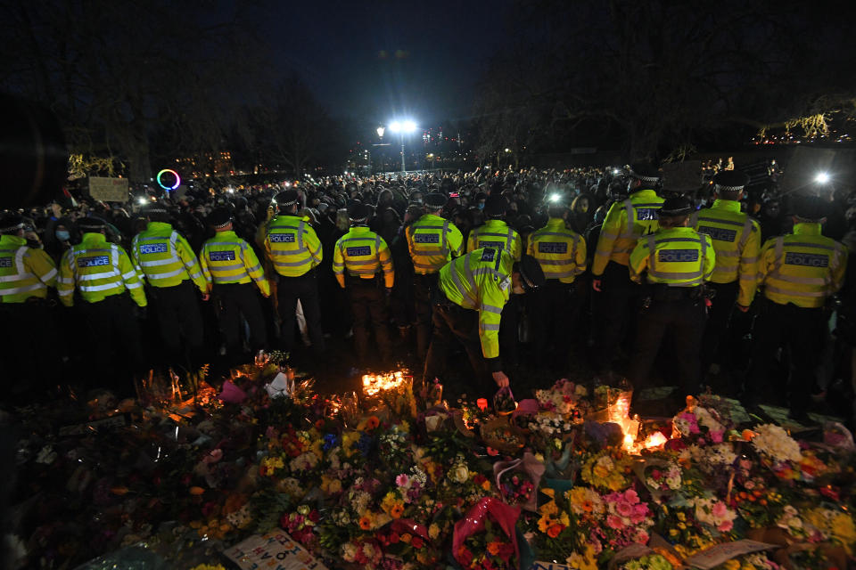 Police surround the band stand in Clapham Common, London, after the Reclaim These Streets vigil for Sarah Everard was officially cancelled. Serving police constable Wayne Couzens, 48, has appeared in court charged with kidnapping and killing the marketing executive, who went missing while walking home from a friend's flat in south London on March 3. Picture date: Saturday March 13, 2021.