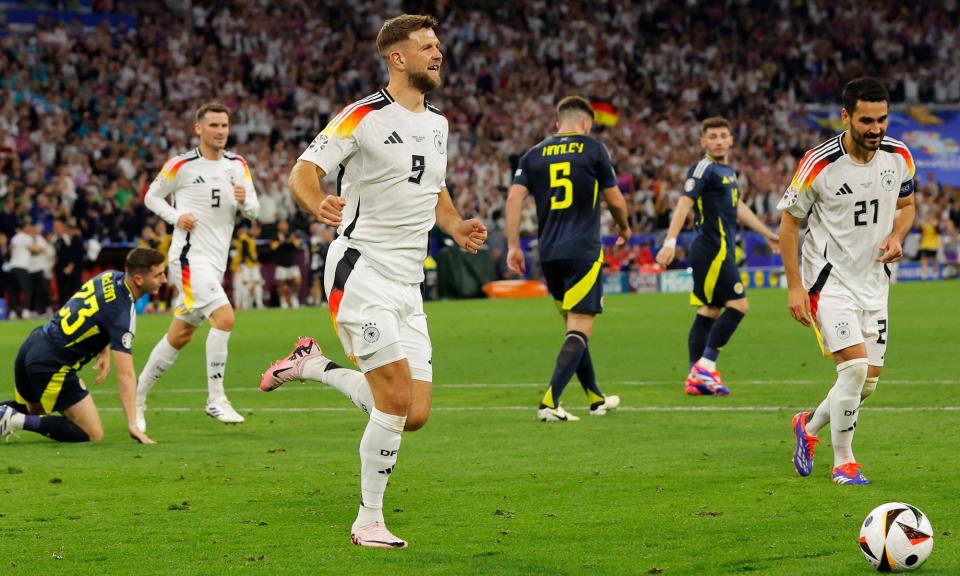 <span>Niclas Füllkrug celebrates after firing in Germany’s fourth goal of the game in Munich.</span><span>Photograph: Tom Jenkins/The Guardian</span>