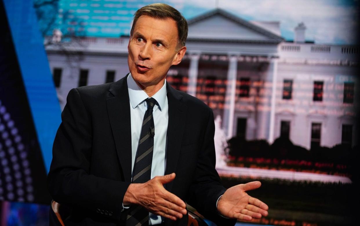 Jeremy Hunt during a television interview in New York