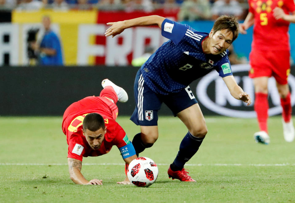 <p>Japan’s Genki Haraguchi in action with Belgium’s Eden Hazard REUTERS/Jorge Silva </p>