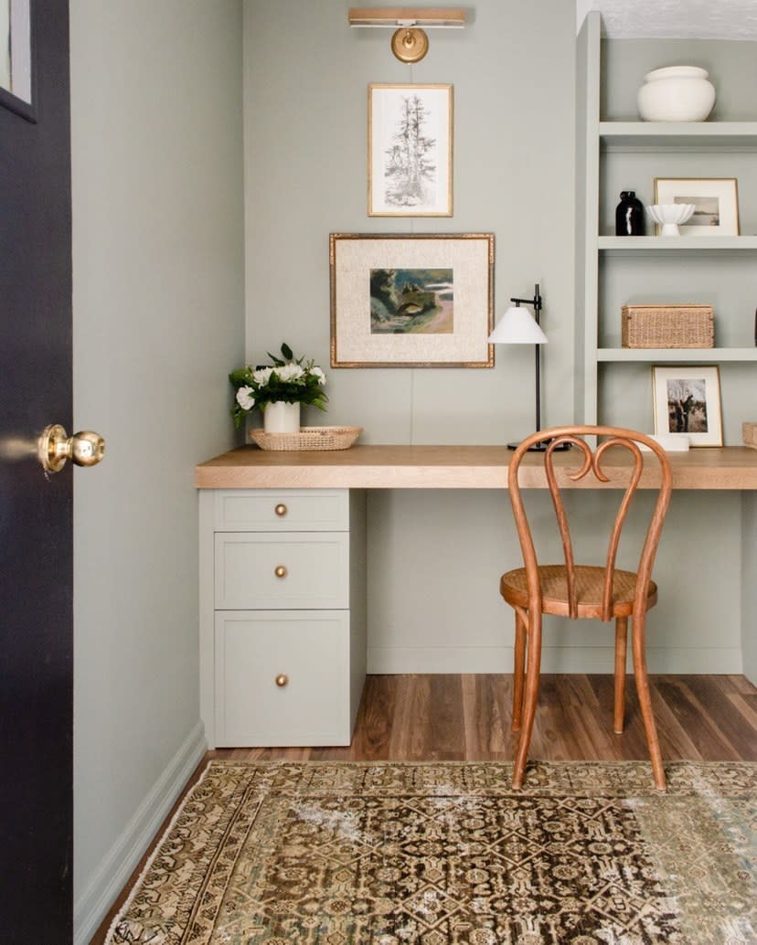 grey cabinets and wooden built in top for a home office