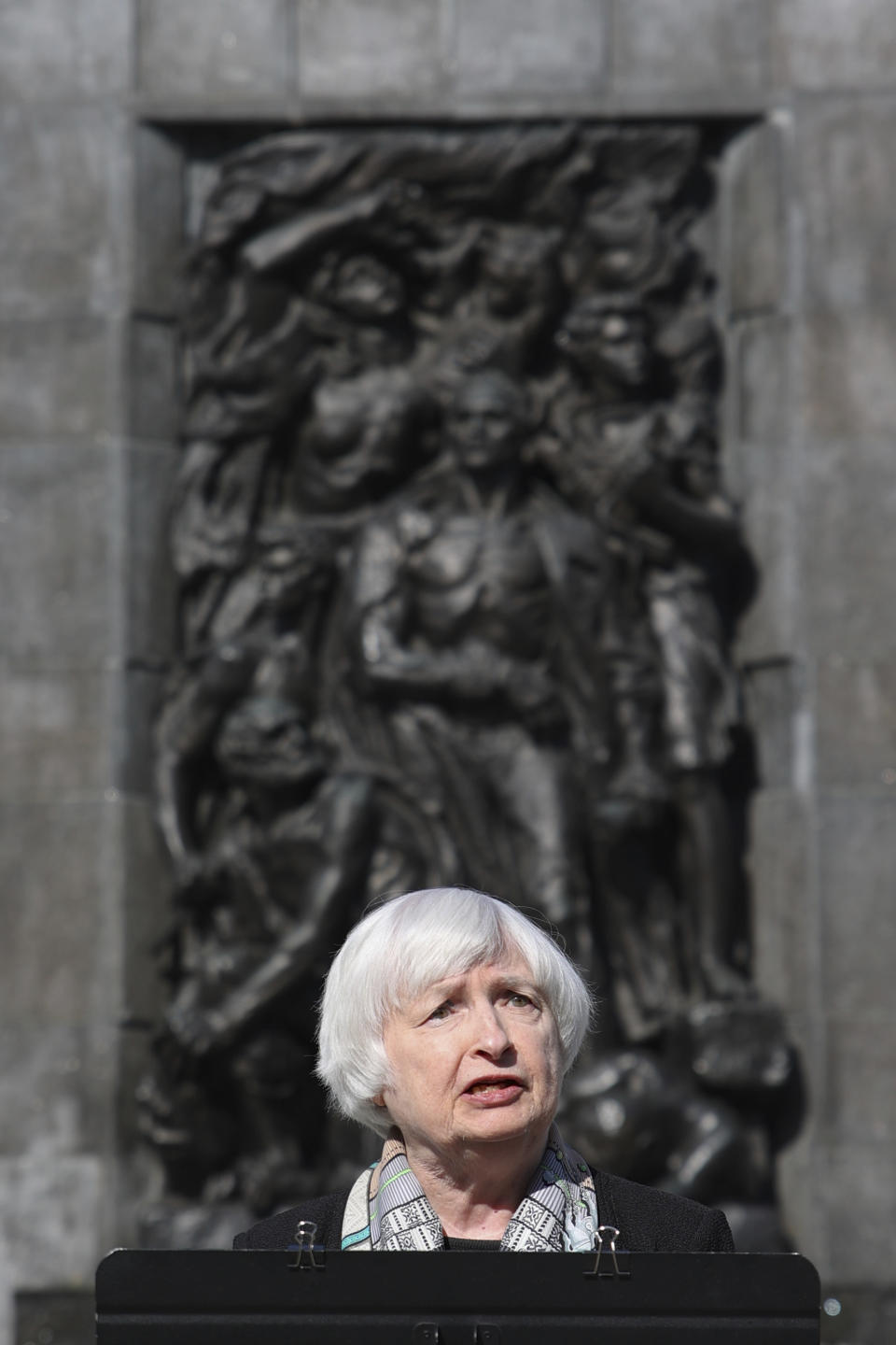 U.S Treasury Secretary Janet Yellen speaks in front of the Ghetto Heroes Monument in Warsaw, Poland, Monday, May 16, 2022. (AP Photo/Michal Dyjuk)