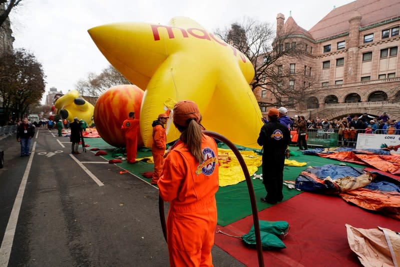 The Macy's Thanksgiving Day Parade inflation team makes preparations for a Macy's balloon in New York