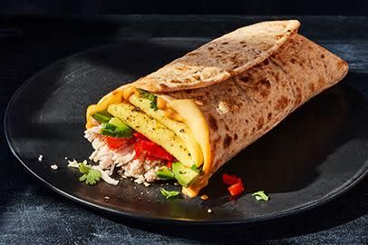 <p>This roll-up is a solid day starter. Not only does it contain an impressive amount of protein and a decent amount of fiber, but it features something most other fast-food breakfast sandwiches do not: actual vegetables. The avocado is nice, but don't overlook the spicy-sweet peppadew peppers.</p><p><em>Nutrition per wrap: 450 calories, 29g protein, 32g carbs (4g fiber), 25g fat</em></p>