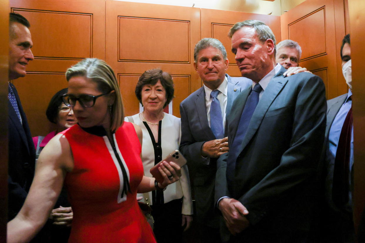 U.S. Senators Mitt Romney, Kyrsten Sinema, Susan Collins, Joe Manchin and Mark Warner depart after attending a bipartisan work group meeting on an infrastructure bill at the U.S. Capitol in Washington, U.S., June 8, 2021. REUTERS/Evelyn Hockstein