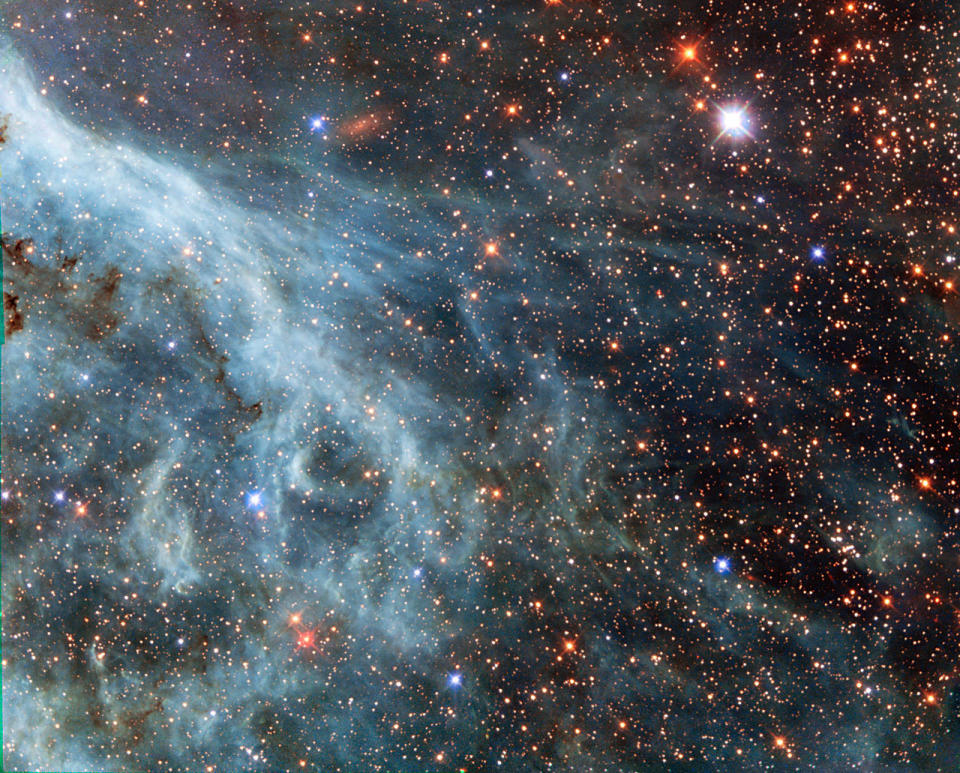 This Hubble image shows a portion of the <a href="https://www.flickr.com/photos/hubble_esa/15344307609" target="_blank">Large Magellanic Cloud</a>, a small nearby galaxy that orbits our galaxy, the Milky Way.