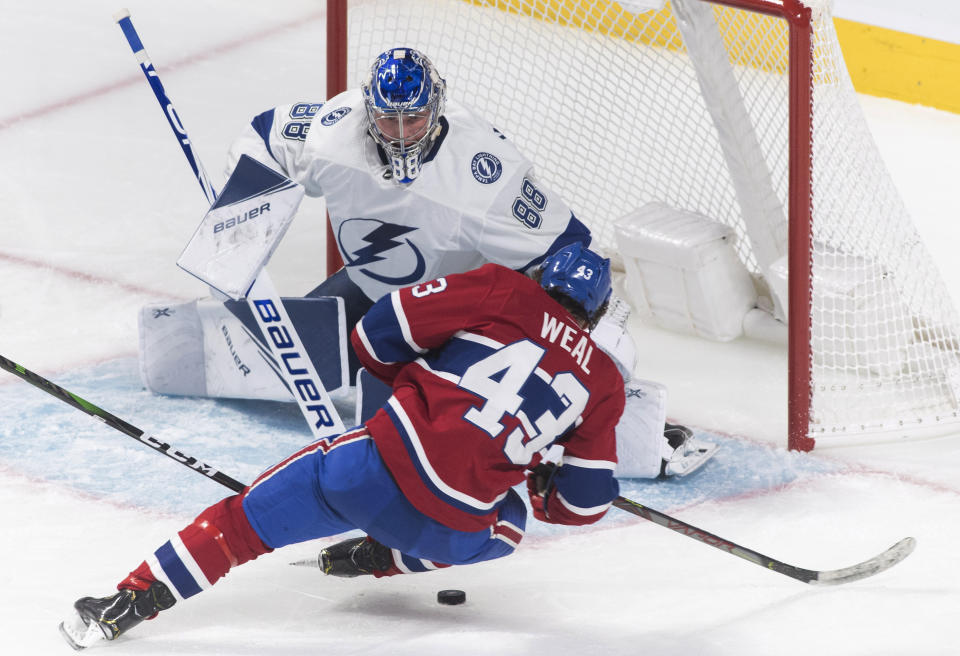 Montreal Canadiens' Jordan Weal (43) moves in on Tampa Bay Lightning goaltender Andrei Vasilevskiy during the second period of an NHL hockey game Thursday, Jan. 2, 2020, in Montreal. (Graham Hughes/The Canadian Press via AP)