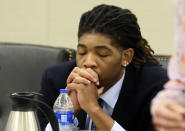 Former Virginia Tech football player Isimemen David Etute sits at the defense table during his trial in Montgomery County Circuit Court in Christiansburg, Va., Friday May 27 2022. Etute is accused of fatally beating Jerry Smith, 40 in May 2021, a man he met on an online dating site and had initially believed to be a woman. (Matt Gentry/The Roanoke Times via AP)