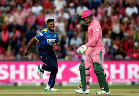 Cricket - South Africa v Sri Lanka - Third One Day International cricket match - Wanderers Stadium, Johannesburg, South Africa - 4/2/17 - Sri LankaÕs Lahiru Kumara celebrates bowling out South AfricaÕs Quinton de Kock. REUTERS/Siphiwe Sibeko