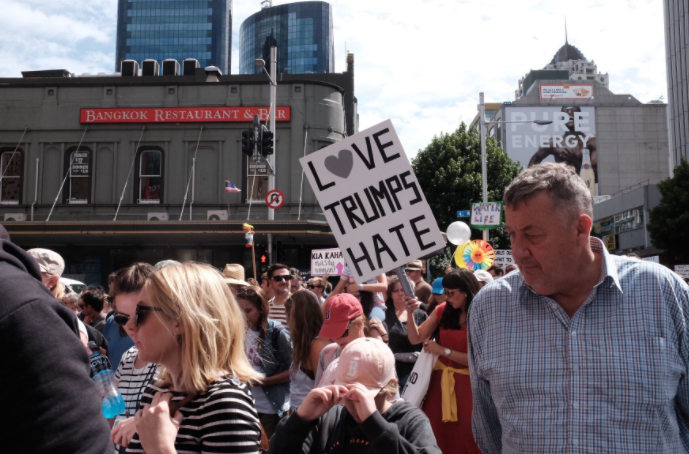 Protesters carried banners, signs and wore anti-Trump t-shirts. Source: Twitter, girl with tattoos.