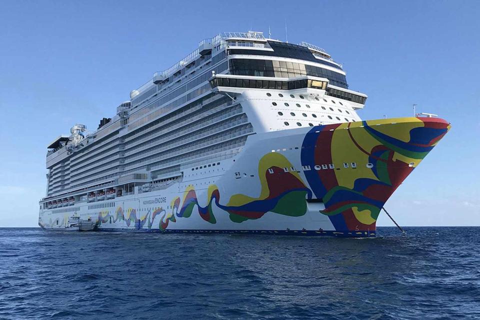 <p>Richard Tribou/Orlando Sentinel/Tribune News Service via Getty</p> The Norwegian Encore cruise ship during its inaugural sailing from PortMiami in 2019