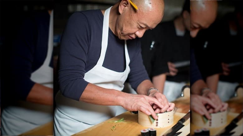 Chef Masa Takayama makes sushi