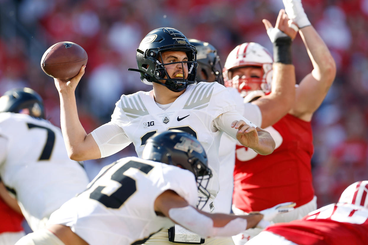 Purdue quarterback Aidan O'Connell throws against Wisconsin at Camp Randall Stadium on October 22, 2022 in Madison, Wisconsin. (Photo by John Fisher/Getty Images)