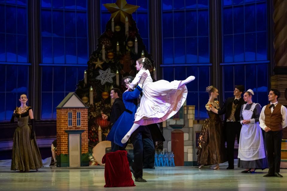 Lily Quinton plays Young Clara Stahlbaum and Benjamin Tucker plays Drosselmeyer in Oklahoma City Ballet's 2022 production of "The Nutcracker."