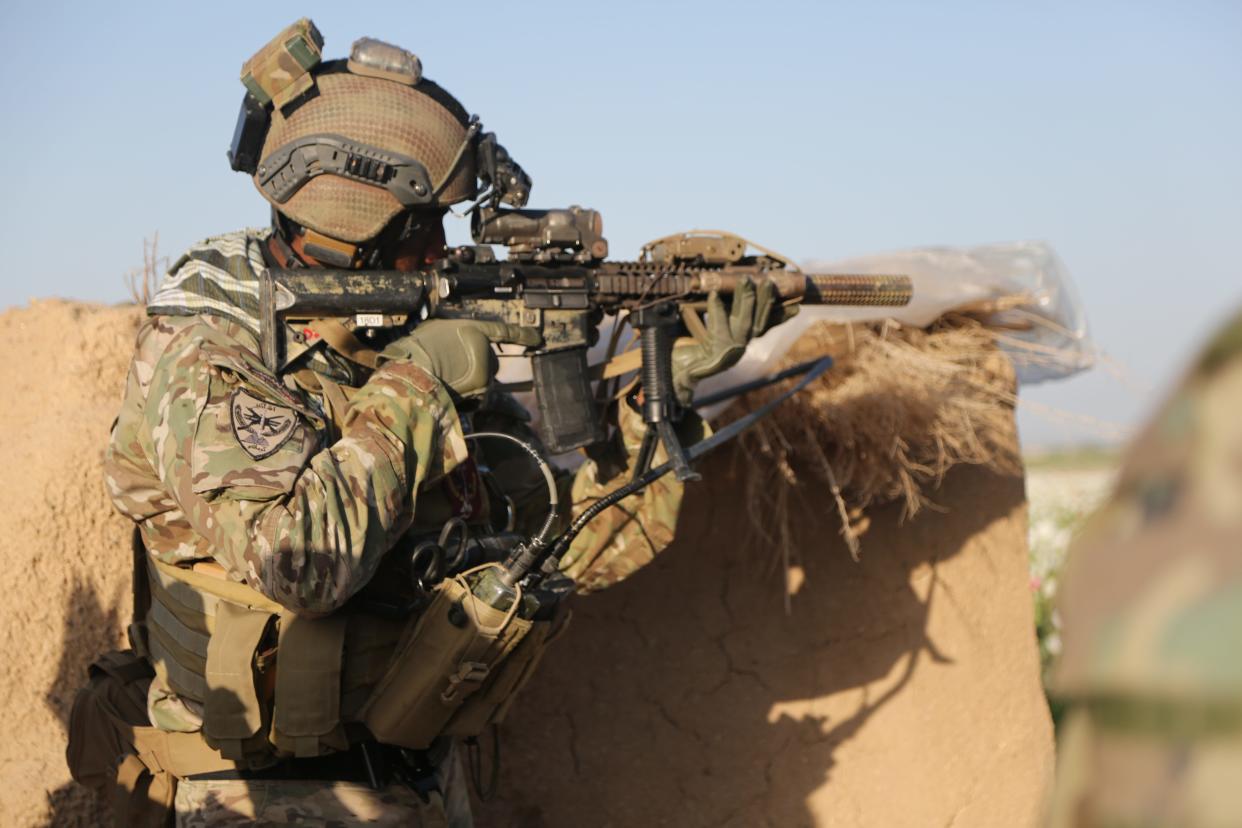 A U.S. Army Special Forces soldier assigned to Combined Joint Special Operations Task Force-Afghanistan provides security during an advising mission in Afghanistan, April 10, 2014.