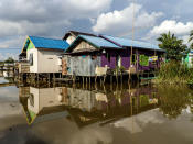 House on stilts: Some of the houses had lost their footing and were slowly merging with the canals, looking like old men slowly crouching for a hot spring bath. (