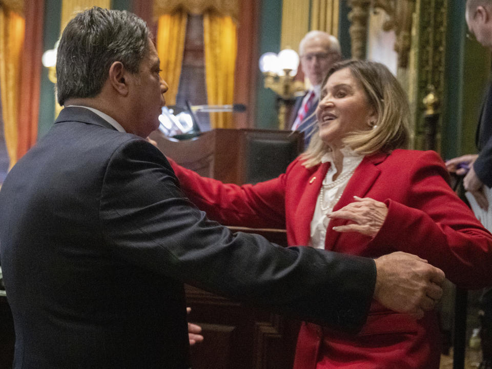 Newly-elected Pennsylvania President Pro Tempore, state, Sen. Kim Ward is congratulated by Senate Democratic Leader Jay Costa, Tuesday, Jan. 3, 2023, in Harrisburg, Pa. (Mark Pynes/The Patriot-News via AP)