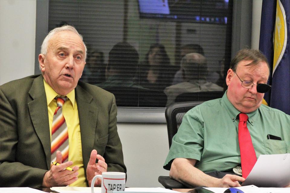 Cascade County Commissioners Don Ryan (left) and Joe Briggs attempt to explain the election recount process