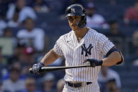 New York Yankees' Giancarlo Stanton reacts after striking out against Chicago White Sox starting pitcher Johnny Cueto (47) in the sixth inning of a baseball game, Sunday, May 22, 2022, in New York. (AP Photo/John Minchillo)