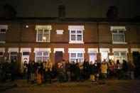 LEICESTER, UNITED KINGDOM - NOVEMBER 13: Families and locals gather to watch fireworks during the Hindu festival of Diwali on November 13, 2012 in Leicester, United Kingdom. Up to 35,000 people attended the Diwali festival of light in Leicester's Golden Mile in the heart of the city's asian community. The festival is an opportunity for Hindus to honour Lakshmi, the goddess of wealth and other gods. Leicester's celebrations are one of the biggest in the world outside India. Sikhs and Jains also celebrate Diwali. (Photo by Christopher Furlong/Getty Images)