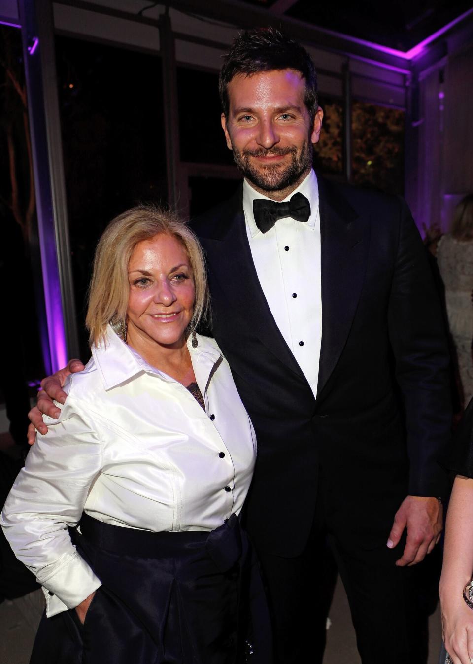 Actor Bradley Cooper (R) and Gloria Campano attend the 2014 Vanity Fair Oscar Party Hosted By Graydon Carter on March 2, 2014 in West Hollywood, California.