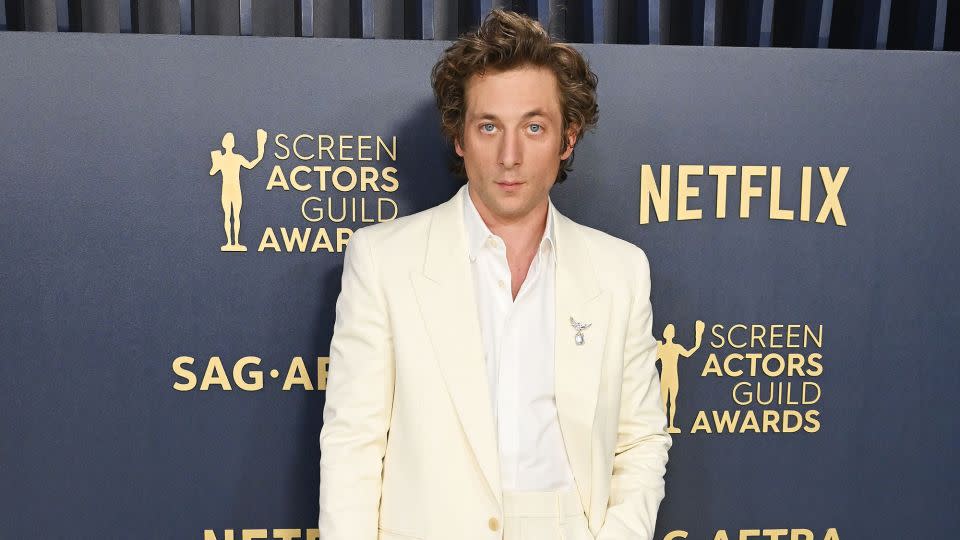 Jeremy Allen White in cream Saint Laurent. - Gilbert Flores/Variety/Getty Images