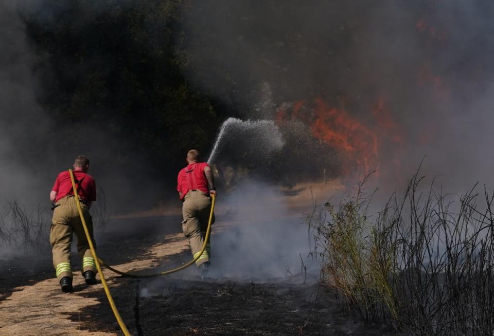 More extreme heat and drought conditions are expected in the southern half of the UK this weekend, while the northern half is set to be struck by thunderstorms and floods (Yui Mok/PA) (PA Wire)