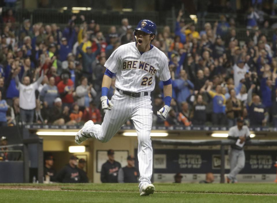 Milwaukee Brewers' Christian Yelich celebrates after hitting a home run during the seventh inning of a baseball game against the Detroit Tigers Saturday, Sept. 29, 2018, in Milwaukee. (AP Photo/Morry Gash)