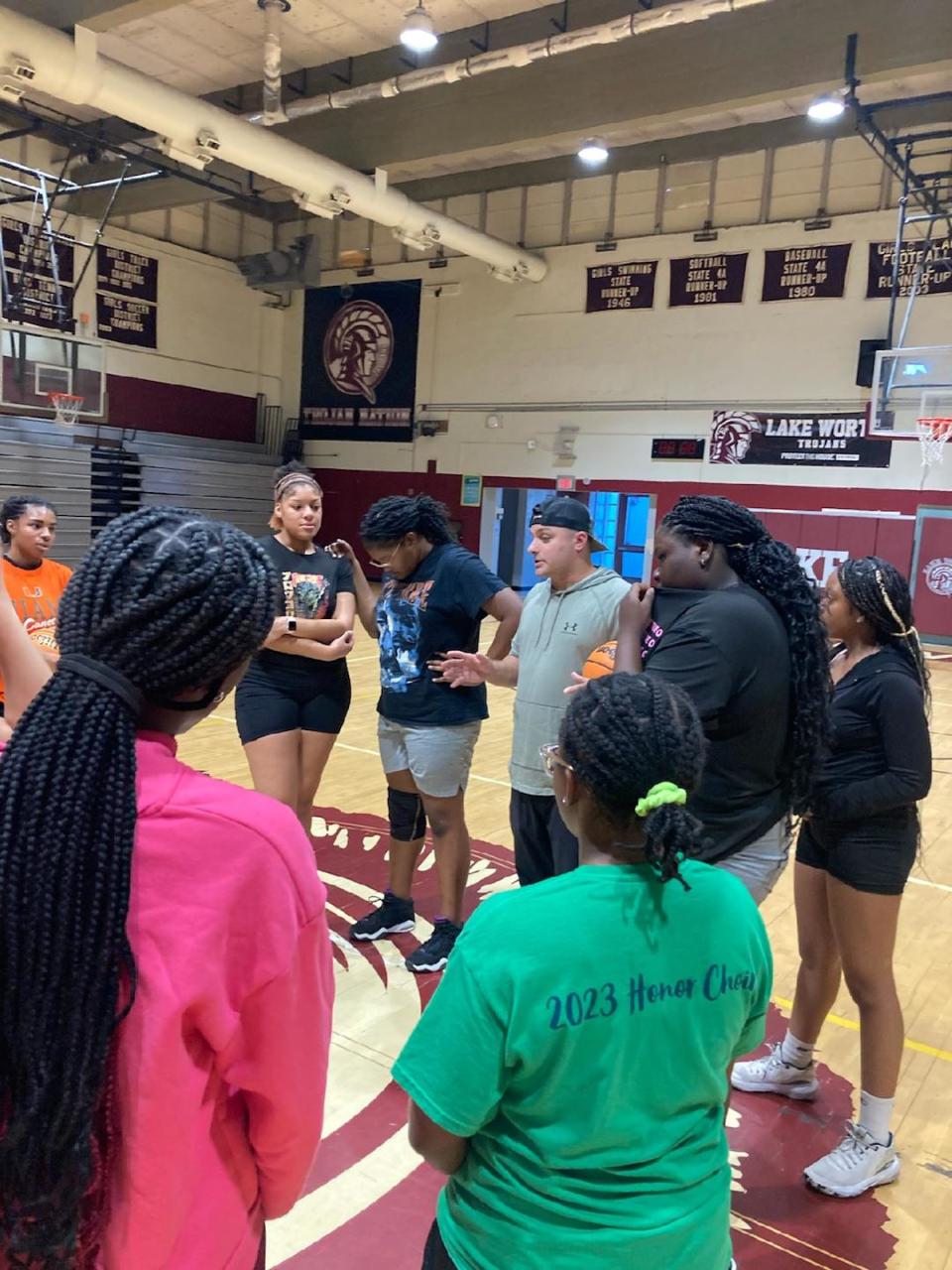 Lake Worth girls basketball head coach Kyle DeMeo leads practice with the Trojans on Tuesday in Lake Worth Beach.