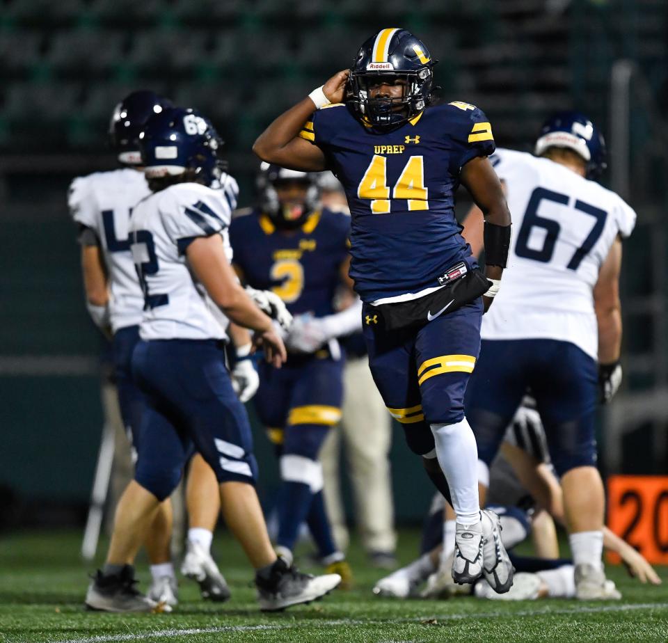 University Prep's Isaiah Moonschein celebrates a defensive stop during a Section V Class AA football semifinal, Friday, Nov. 4, 2022. No. 4 seed Pittsford advanced to the Class AA final with a 6-0 win over No. 1 seed University Prep.