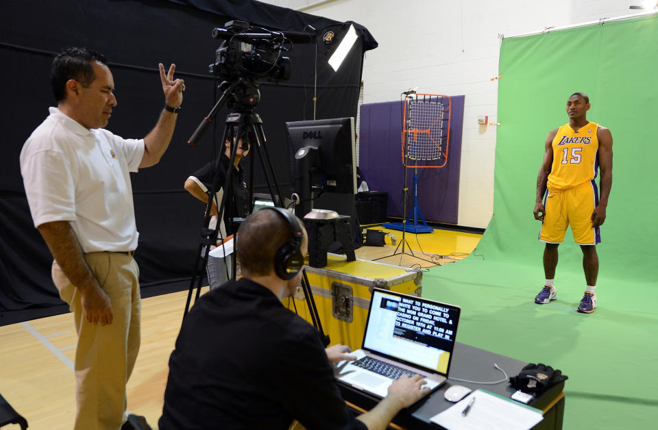 EL SEGUNDO, CA - OCTOBER 01: Metta World Peace #15 of the Los Angeles Lakers takes direction on set during Media Day at Toyota Sports Center on October 1, 2012 in El Segundo, California. (Photo by Harry How/Getty Images)