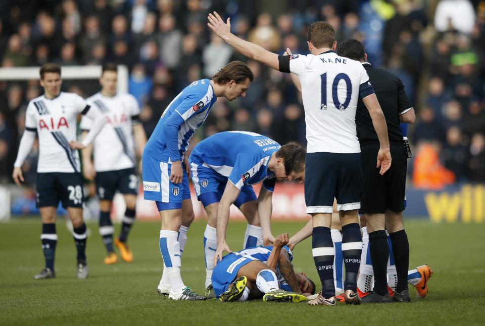 Football Soccer - Colchester United v Tottenham Hotspur - FA Cup Fourth Round - Weston Homes Community Stadium - 30/1/16 Colchester United's Alex Wynter lies injured Action Images via Reuters / Paul Childs Livepic EDITORIAL USE ONLY. No use with unauthorized audio, video, data, fixture lists, club/league logos or "live" services. Online in-match use limited to 45 images, no video emulation. No use in betting, games or single club/league/player publications. Please contact your account representative for further details.