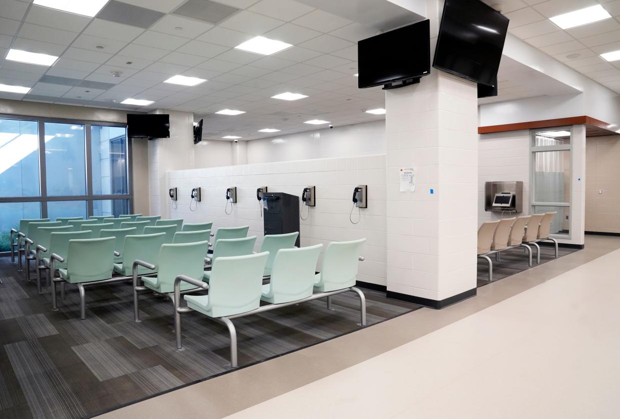 Two waiting areas adjacent to the intake and booking center inside the new James A. Karnes Corrections Center serving Franklin County.