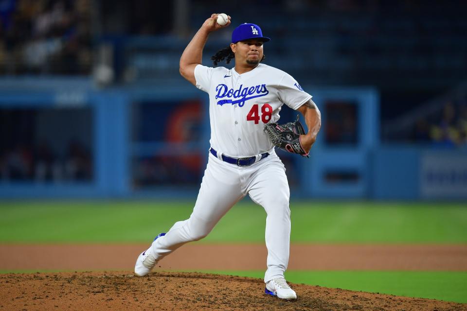 Los Angeles Dodgers relief pitcher Brusdar Graterol (48) throws against the Detroit Tigers during the eighth inning at Dodger Stadium.