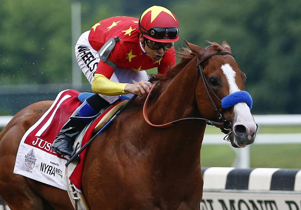 FILE - In this June 9, 2018, file photo, Justify (1), with jockey Mike Smith up, crosses the finish line to win the 150th running of the Belmont Stakes horse race and the Triple Crown in Elmont, N.Y. Smith will handle Authentic for the first time in Saturday's, July 18, 2020, Haskell Stakes at Monmouth Park.(AP Photo/Peter Morgan, File